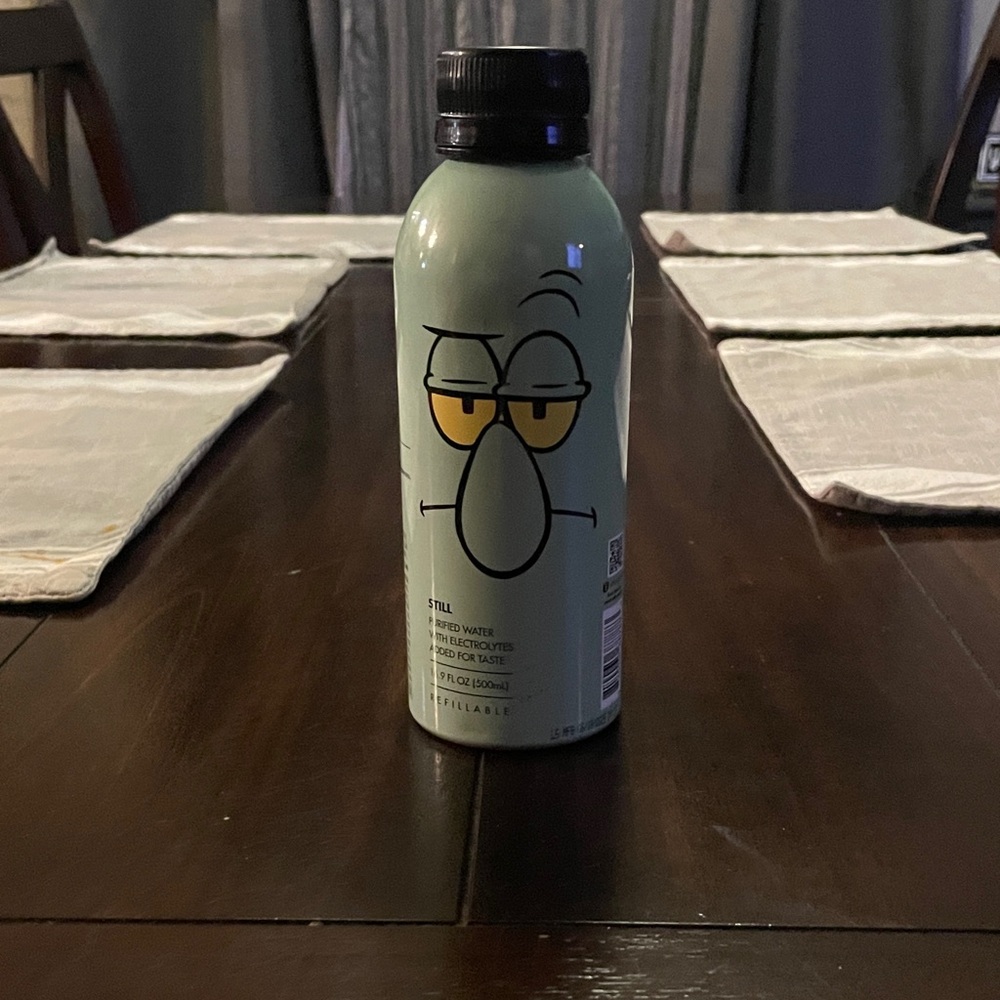 Waterford Crystal Green Bottle with Cartoon Design